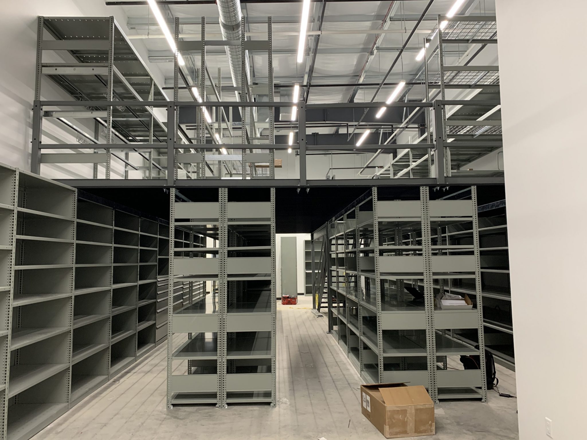 Parts Room with Shelving Above and Below Mezzanine