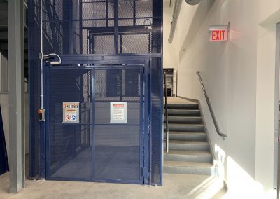 Dealership parts storage area lift elevator